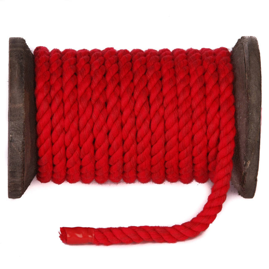 Knotty Desires Twisted Cotton Bondage Rope in Red on a spool.