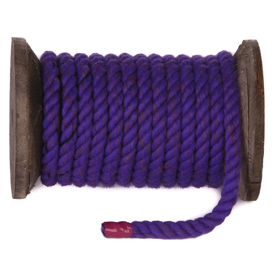 Knotty Desires Twisted Cotton Bondage Rope in purple on a spool.