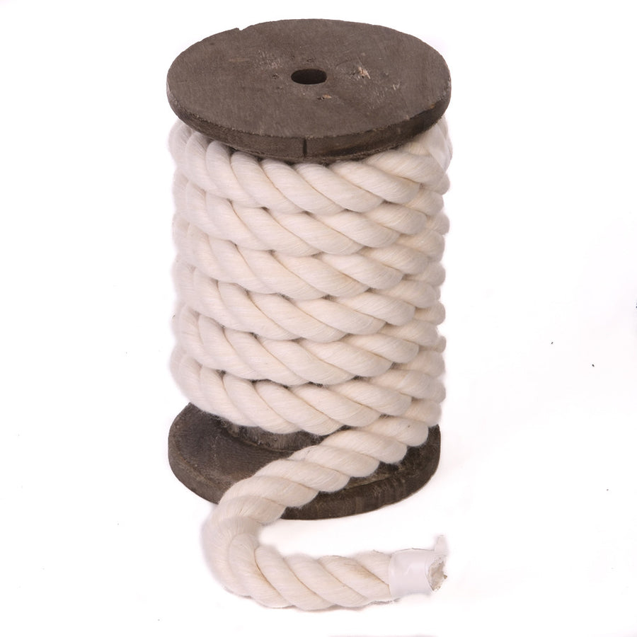 Knotty Desires Natural White Twisted Cotton Bondage Rope on a spool standing vertically.