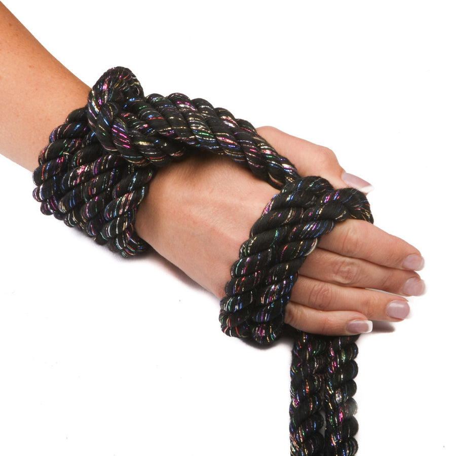 Knotty Desires Twisted Cotton Bondage Rope in black glitter knotted on a hand.