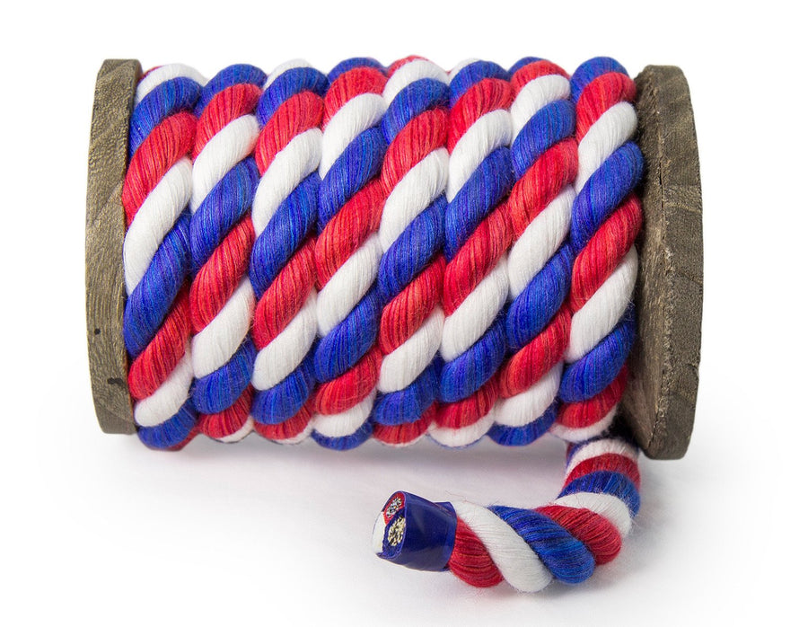 Knotty Desires Twisted Cotton Bondage Rope in Red, White, and Blue on a spool.