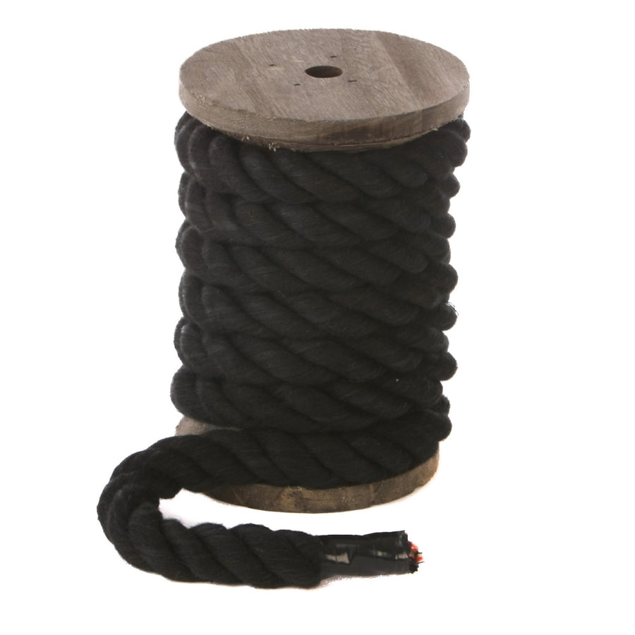 Knotty Desires Twisted Cotton Bondage Rope in black on a spool standing vertically.