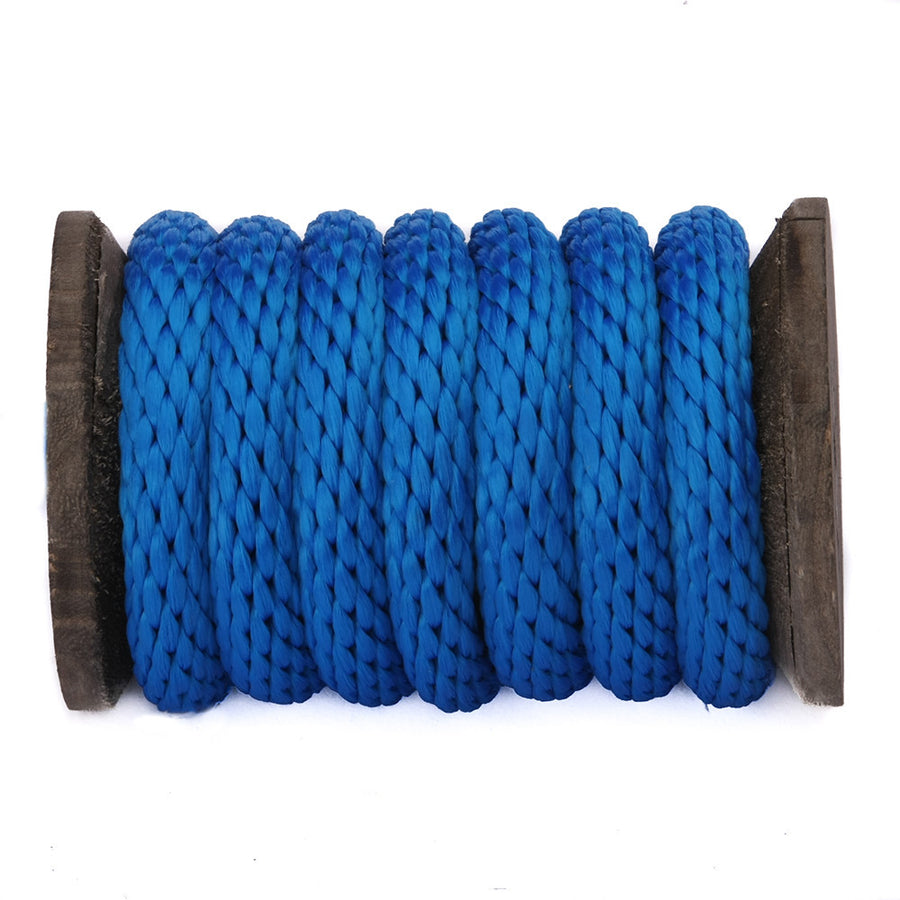 Knotty Desires blue polypropylene bondage rope on a spool.