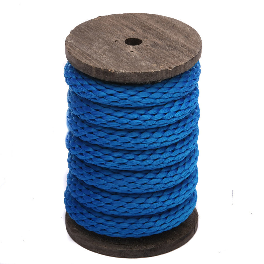 Knotty Desires blue polypropylene bondage rope on a spool standing vertically.