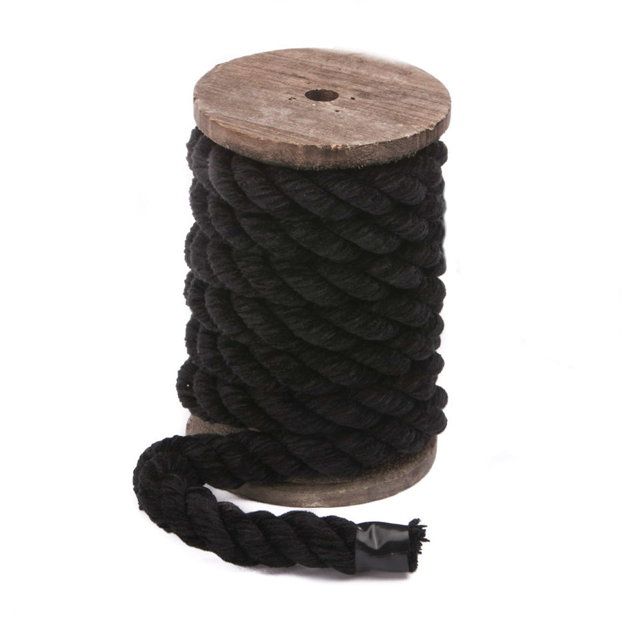 Knotty Desires Twisted Chenille Bondage Rope in black on a vertical spool.
