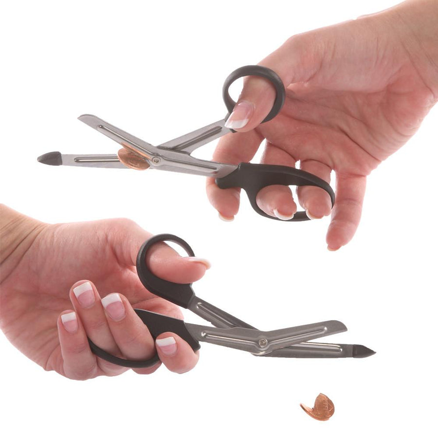 Knotty Desires EMT Scissors cutting through a penny.