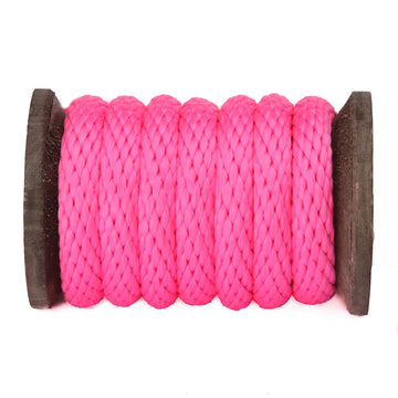 Knotty Desires hot pink bondage rope on a spool
