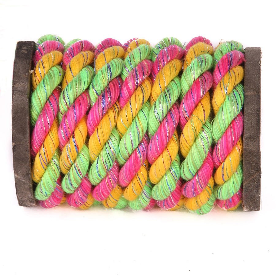 Knotty Desires Twisted Cotton Bondage Rope in pink glitter, gold, and lime on a spool.