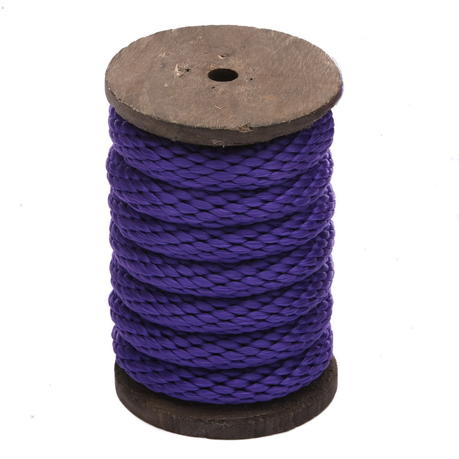 Knotty Desires Purple Polypropylene Bondage Rope on a spool standing vertically.