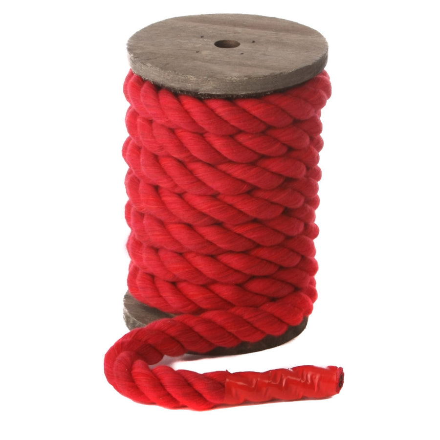 Red Twisted Cotton Bondage Rope by Knotty Desires on a spool.